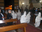 Battenti inginocchiati in chiesa